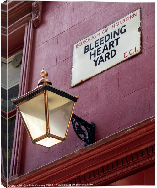 Bleeding Heart Yard in London, UK Canvas Print by Chris Dorney
