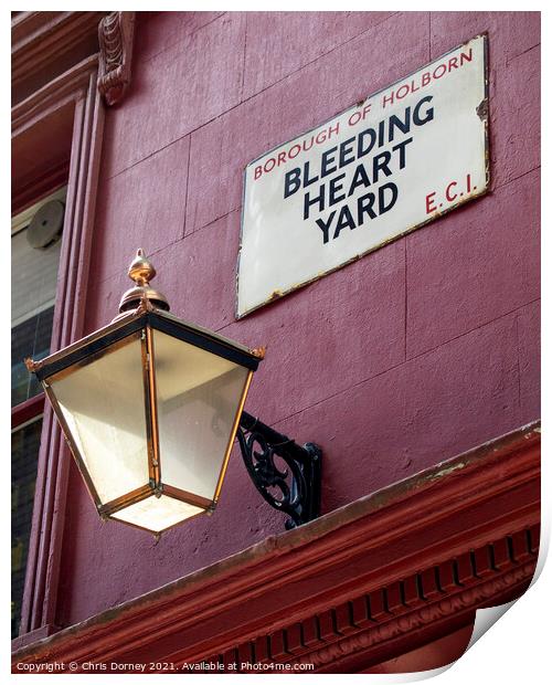 Bleeding Heart Yard in London, UK Print by Chris Dorney