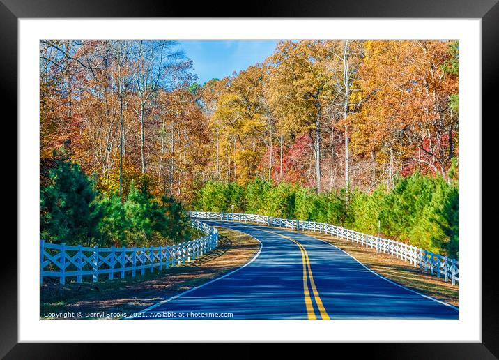 Road Curving Through Autumn Trees and White Fence Framed Mounted Print by Darryl Brooks