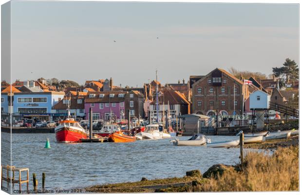 A view towards the quayside of the Port of Wells-Next-The-Sea on the North Norfolk coast Canvas Print by Chris Yaxley
