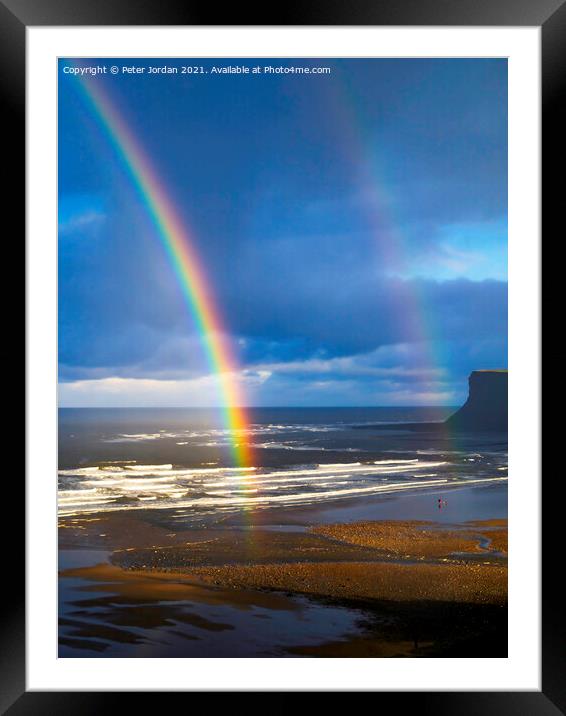 Saltburn Beach  in winter sunshine blue sky  with a double rainbow and a  distant view of looking towards Warsett hill  Framed Mounted Print by Peter Jordan