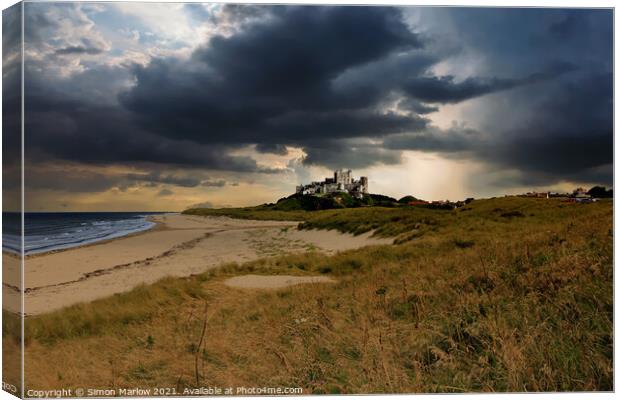 Bamburgh Castle - A storm is brewing Canvas Print by Simon Marlow