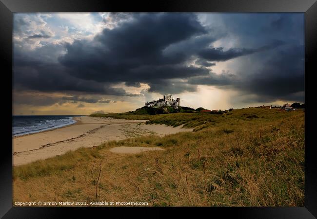 Bamburgh Castle - A storm is brewing Framed Print by Simon Marlow