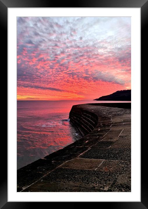Fiery sunset over the Cobb in Lyme Regis Framed Mounted Print by Love Lyme Regis