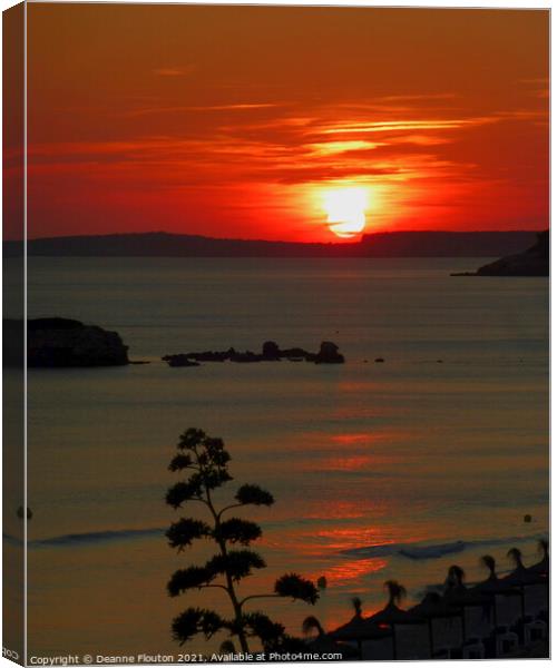 Sunset over Cala Galdana Menorca  Canvas Print by Deanne Flouton