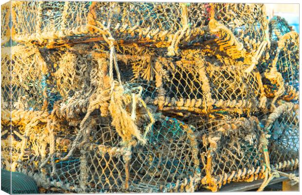 Fishing baskets Canvas Print by Clive Wells
