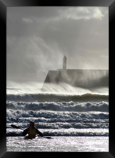 Watching the waves. Framed Print by Glyn Evans