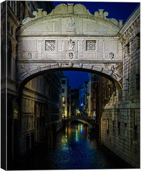 The Venice Bridge of Sighs At Night Canvas Print by Chris Lord
