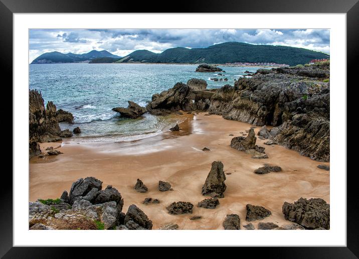 beautiful view of a beach with rocks on the Spanish coast Framed Mounted Print by David Galindo