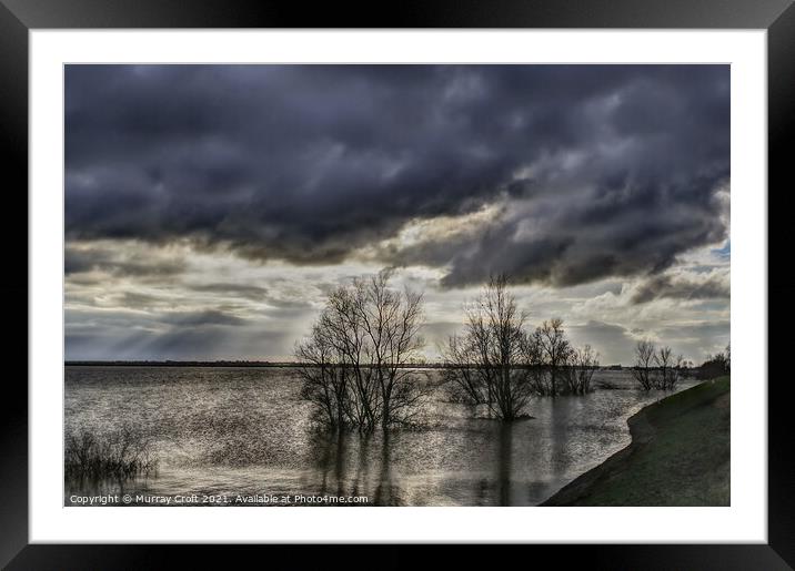 Turbulent skies over Welches Dam, Cambridgeshire Framed Mounted Print by Murray Croft