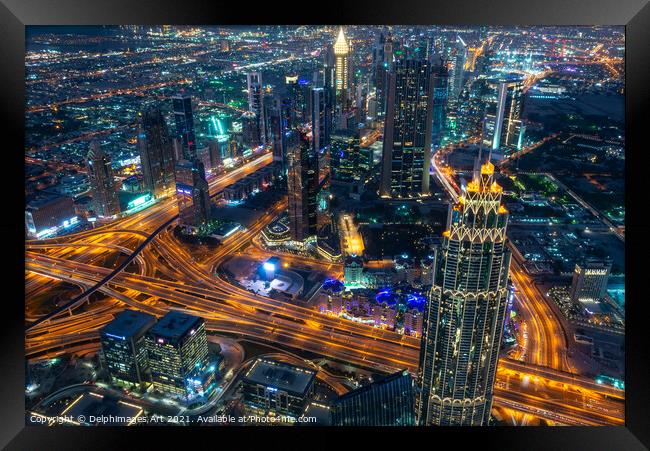 Dubai aerial view at night from Burj Khalifa tower Framed Print by Delphimages Art