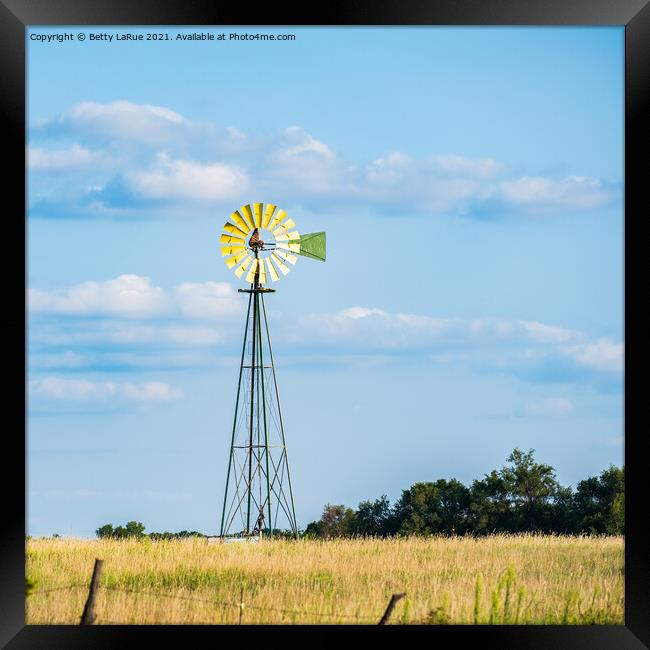 Windmill Against Blue Sky Framed Print by Betty LaRue