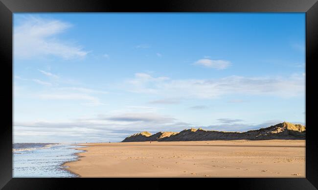 Waves lap up on Formby beach Framed Print by Jason Wells