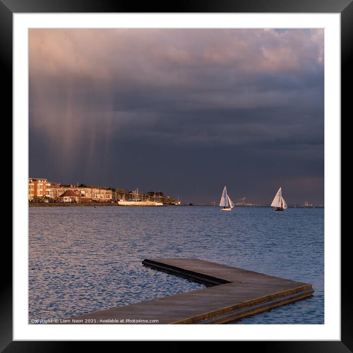Sailing Under Dark Skies Framed Mounted Print by Liam Neon