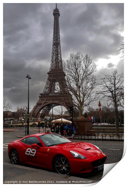 Red Ferrari in front of the Eiffel Tower Print by Ann Biddlecombe
