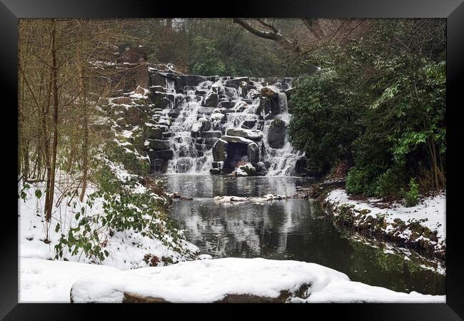 Snow covered Winter Cascades at Virginia Water. Framed Print by Dave Williams