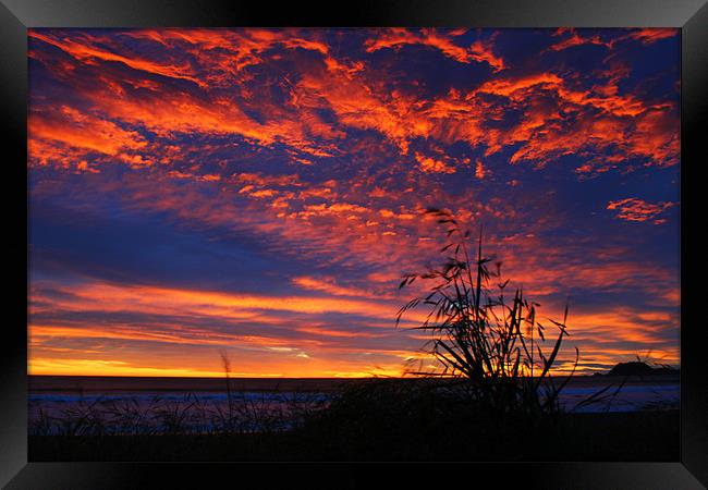 Sunset Sky Framed Print by Neil Gavin