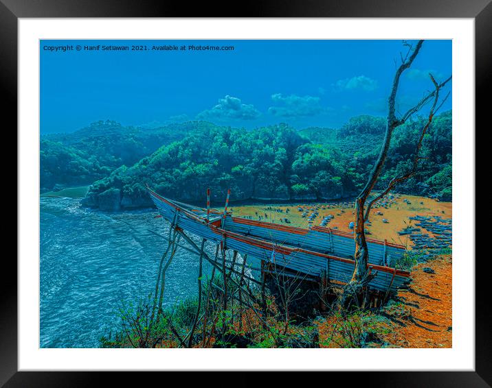 A bamboo fishing boat as high view point over the lagoon beach Baron. Framed Mounted Print by Hanif Setiawan