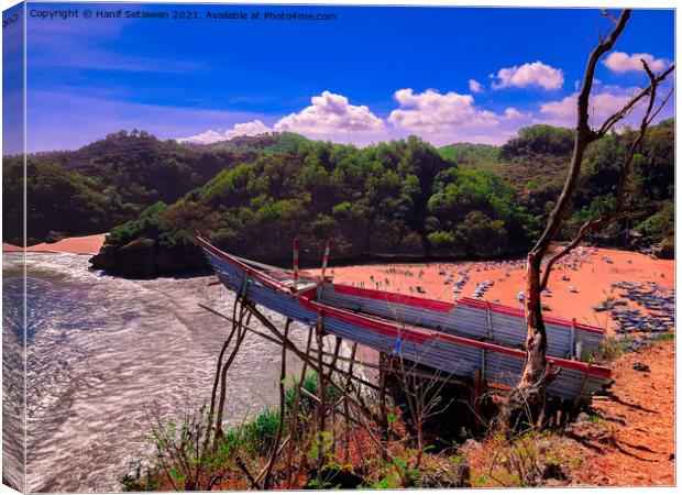 A bamboo fishing boat as high view point over the  Canvas Print by Hanif Setiawan