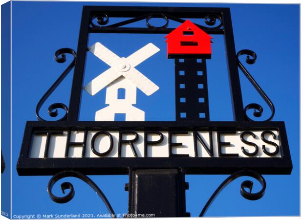 Thorpeness Village Sign showing the Windmill and House in the Cl Canvas Print by Mark Sunderland