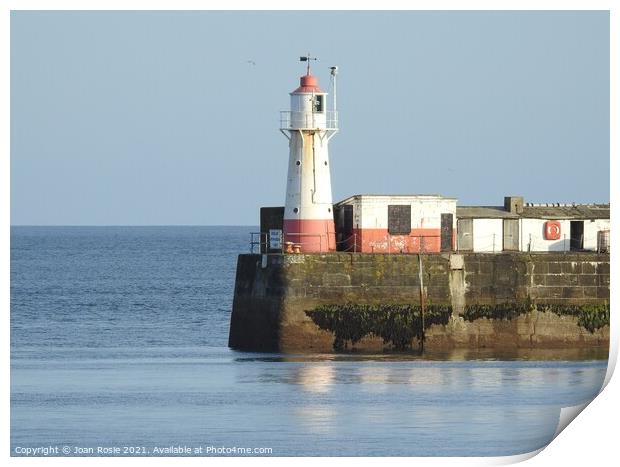 Newlyn lighthouse on a clear day Print by Joan Rosie