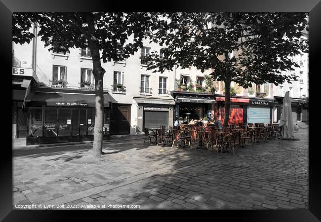 A Square in Paris Framed Print by Lynn Bolt