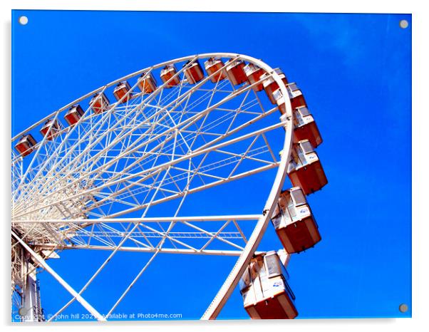 Ferris wheel against a blue sky. Acrylic by john hill