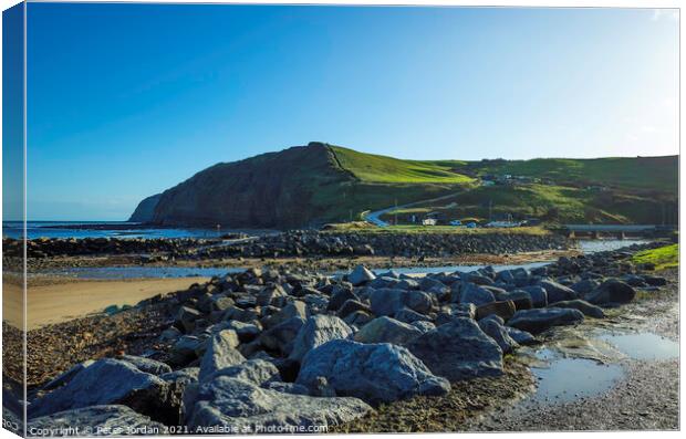 Beaches at Skinningrove North Yorkshire England UK have rock armour to prevent erosion Canvas Print by Peter Jordan