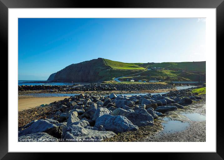 Beaches at Skinningrove North Yorkshire England UK have rock armour to prevent erosion Framed Mounted Print by Peter Jordan