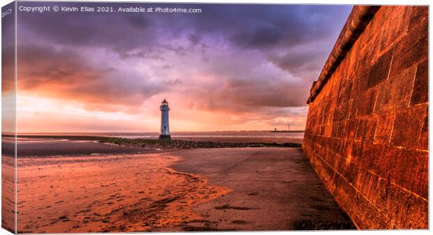 Lighthouse sunset Canvas Print by Kevin Elias