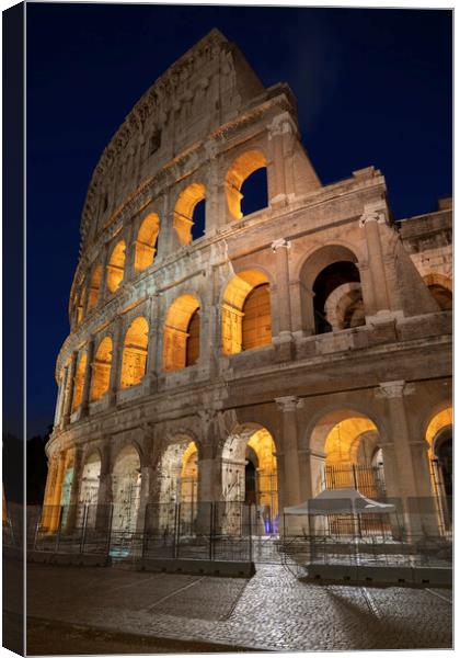 Colosseum at Night in Rome Canvas Print by Artur Bogacki
