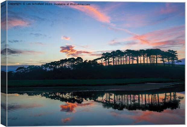 Serene Sunrise at Budleigh Salterton Canvas Print by Les Schofield