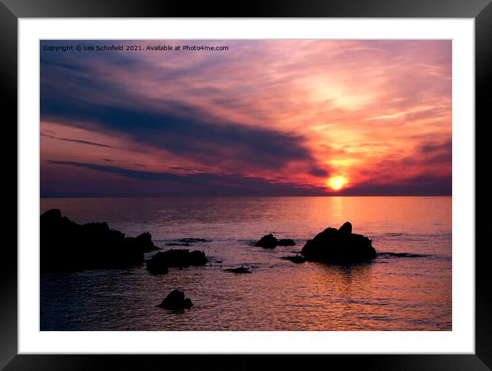 Sunset over Ilfracombe north devon  Framed Mounted Print by Les Schofield