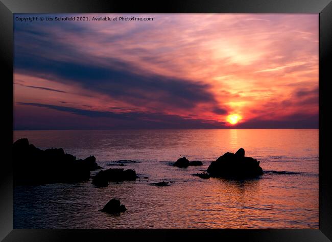 Sunset over Ilfracombe north devon  Framed Print by Les Schofield