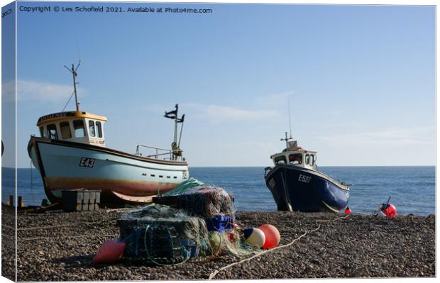 Waiting for the Tide A Serene Fishing Scene in Dev Canvas Print by Les Schofield