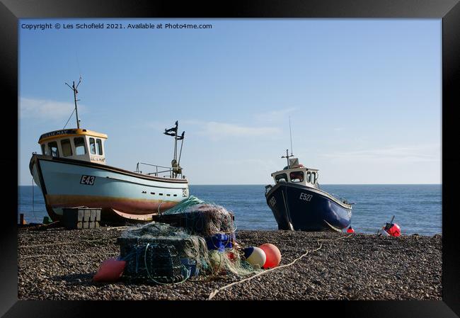 Waiting for the Tide A Serene Fishing Scene in Dev Framed Print by Les Schofield