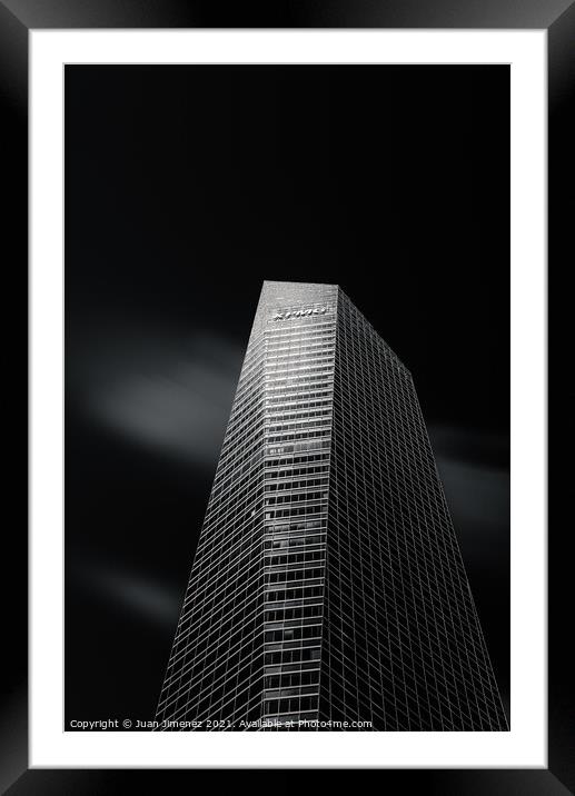 Skyscraper against black sky in Madrid Framed Mounted Print by Juan Jimenez