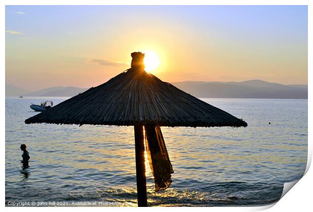 Sunset at Ag Eleni beach at Skiathos in Greece Print by john hill