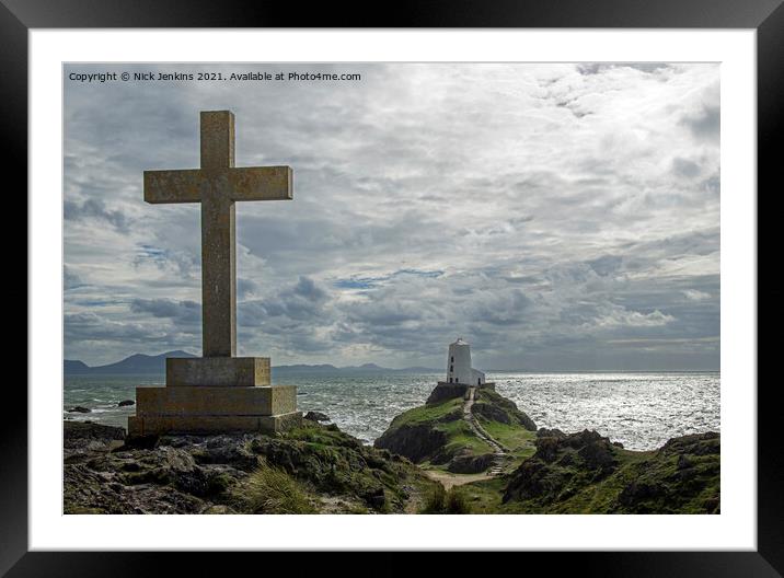 Cross overlooking the Lighthouse Llanddwyn Island Framed Mounted Print by Nick Jenkins