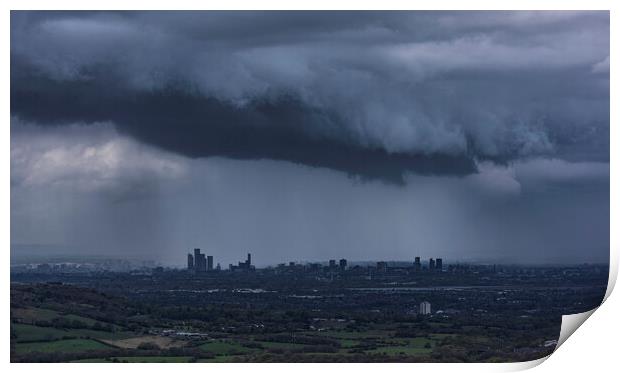 The City of Manchester under stormy skies Print by John Finney