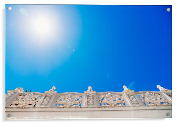 Old style stone balustrade, bottom view with blue sky background Acrylic by Joaquin Corbalan