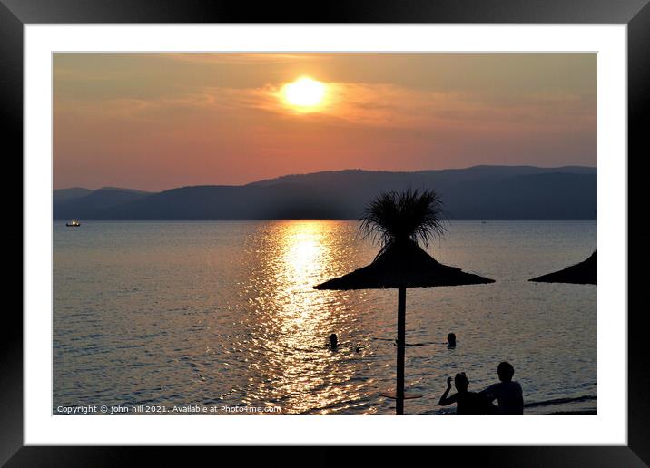 Sunset at Agia Eleni beach on  Skiathos in Greece. Framed Mounted Print by john hill