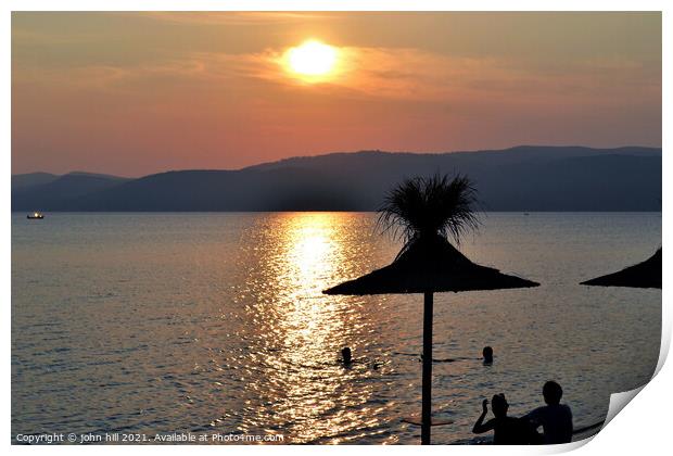 Sunset at Agia Eleni beach on  Skiathos in Greece. Print by john hill