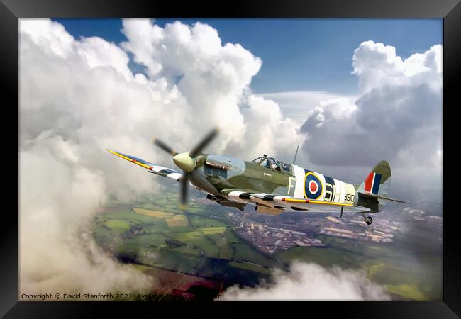 Spitfire breaks through the clouds Framed Print by David Stanforth