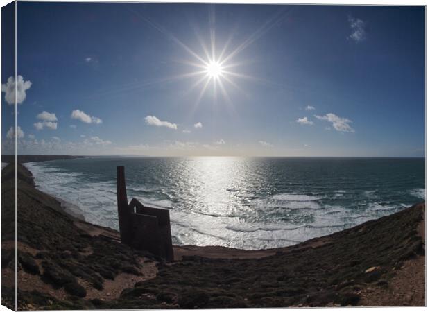 Sun shining over Wheal Coates ruins coast path Canvas Print by mark humpage