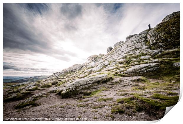 Man Stood Atop Of A Sloping Side Of Haytor Tor, Dartmoor Print by Peter Greenway