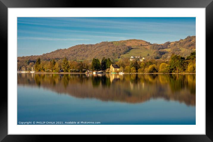 Coniston water boat house reflection in the lake district Cumbria 505  Framed Mounted Print by PHILIP CHALK