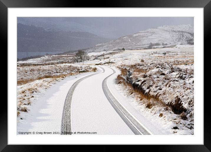 Snow Tracks Framed Mounted Print by Craig Brown