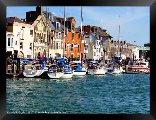 Moored yachts at Weymouth in Dorset. Framed Print by john hill