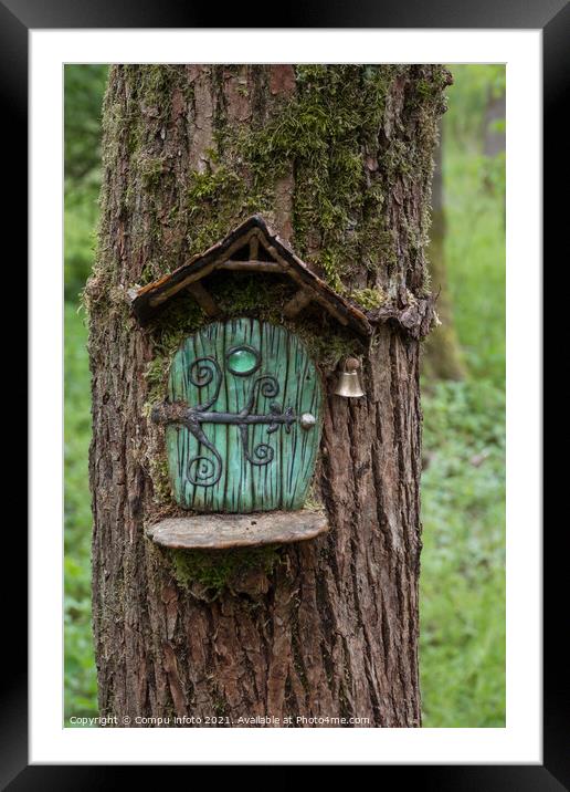green door in a tree Framed Mounted Print by Chris Willemsen